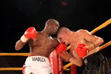 Oosthuizen and Mabuza win world titles